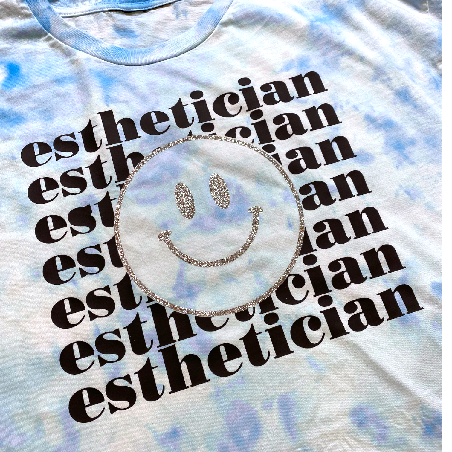 T-SHIRT - ESTHETICIAN ( tie dye, relaxed fit, vinyl print with glitter )